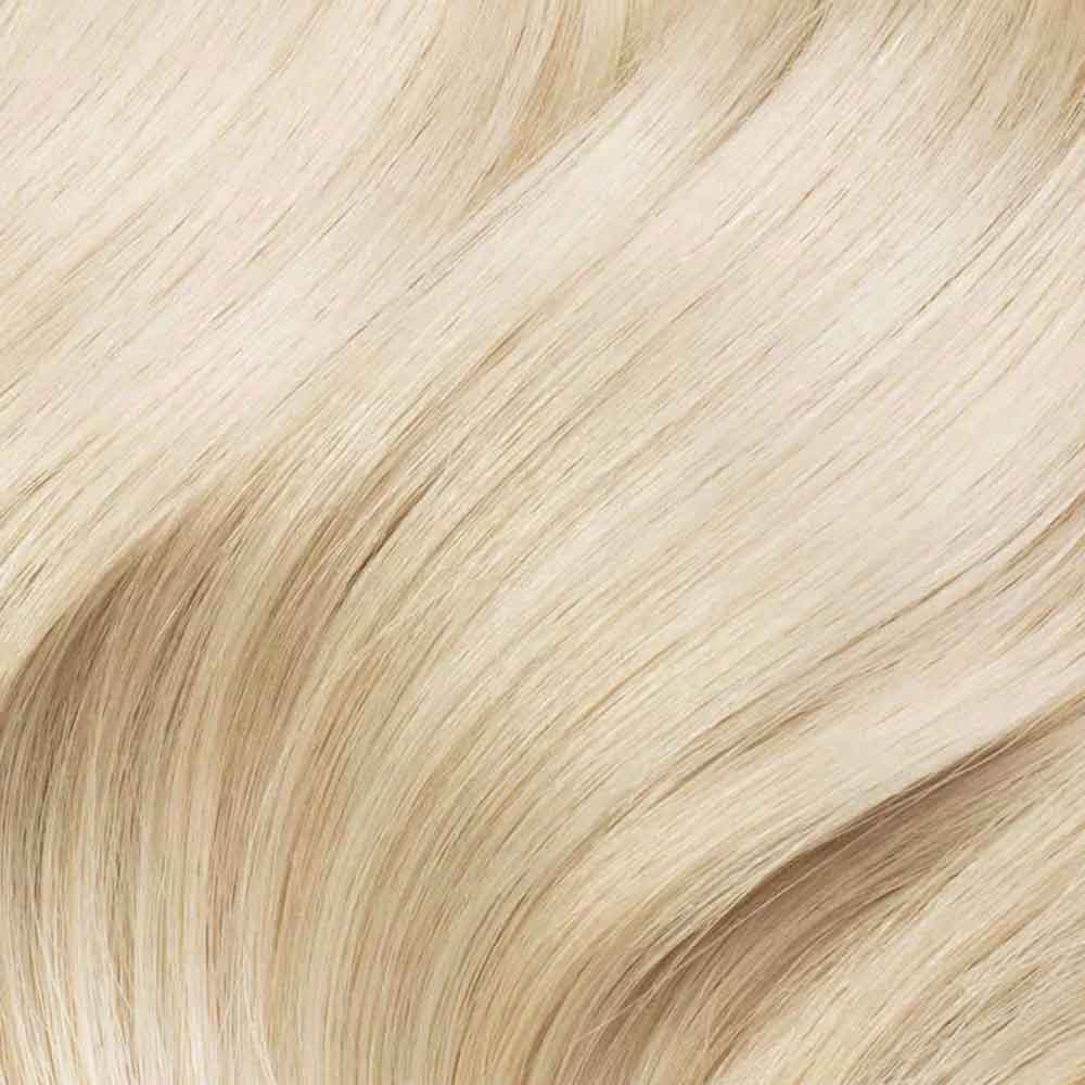 color rubio platino extensiones adhesivas invisibles 4k de cabello injertado imitando la piel del cuero cabelludo